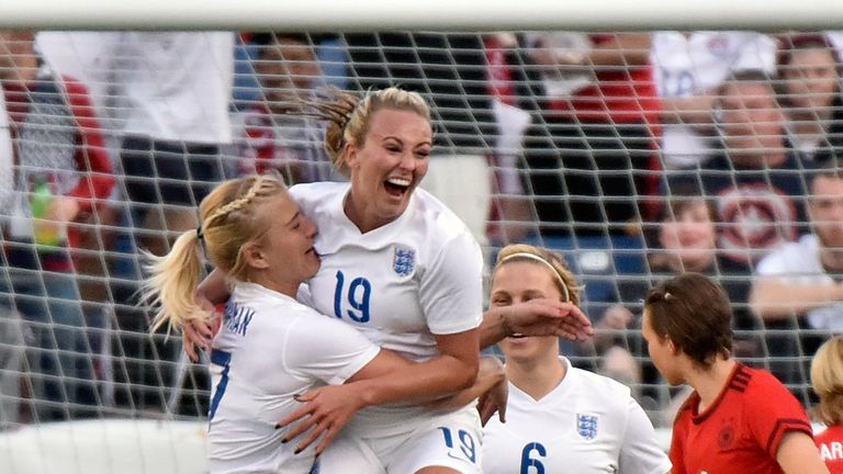 Toni Duggan #19 of England celebrates with teammate Katie Chapman #17 after scoring a goal against Germany