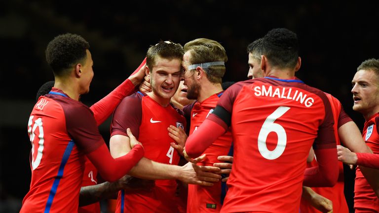 Eric Dier (2nd L) of England celebrates scoring his team's third goal 