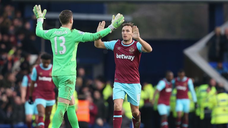 Mark Noble (R) and Adrian (L) celebrate after West Ham's win at Everton