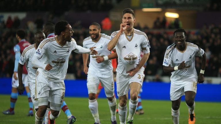 Federico Fernandez celebrates scoring Swansea's first goal against Aston Villa