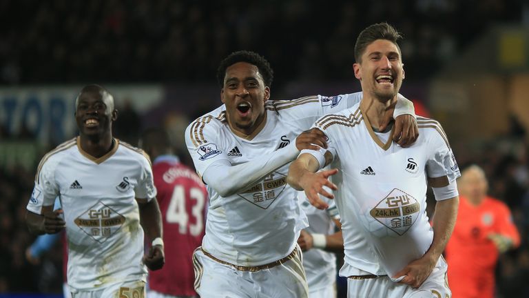 Federico Fernandez (right) celebrates scoring Swansea's winning goal against Aston Villa