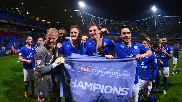 Kasper Schmeichel, Andy King, Chris Wood and Matty James of Leicester City celebrate winning the Championship