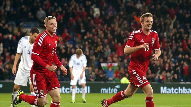 Andy King (right) of Wales celebrates scoring the opening goal with team-mate Simon Church against Finland