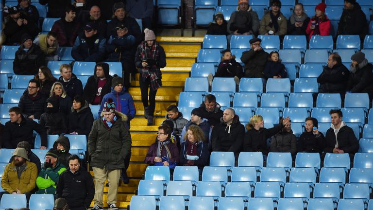 Home supporters leave during the Premier League match between Aston Villa and Everton