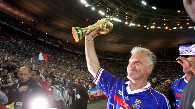 Didier Deschamps holding the World Cup trophy in 1998