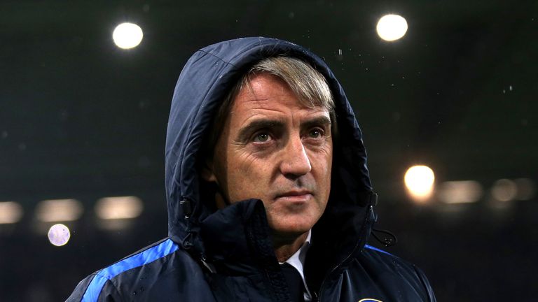 Inter Milan's coach Roberto Mancini looks on during the match against Juventus