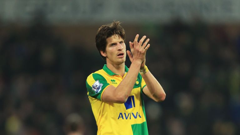NORWICH, ENGLAND - FEBRUARY 13: Timm Klose of Norwich City applauds supporters after his team's 2-2 draw in the Barclays Premier League match between Norwi