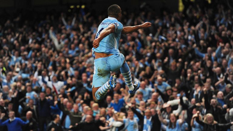 Vincent Kompany of Manchester City celebrates scoring to make it 1-0 against Manchester United