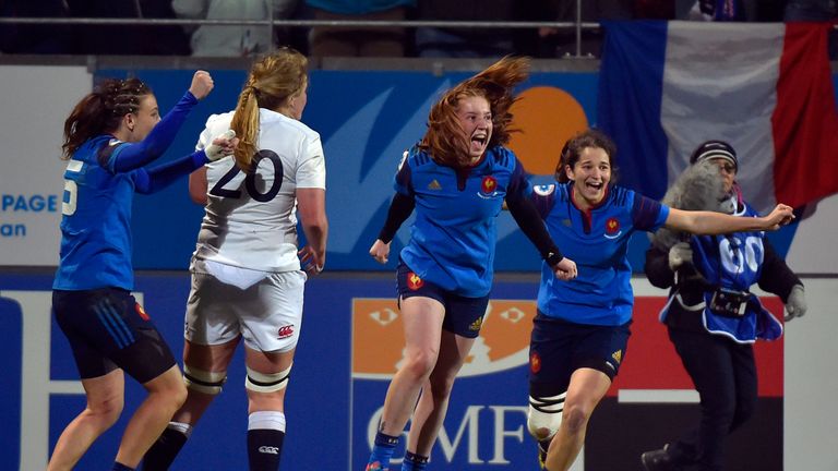 French players celebrate after winning the women Six Nations international rugby union match between France and England