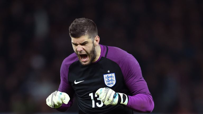 Fraser Forster of England celebrates his team's third goal during the International Friendly match between Germany and England