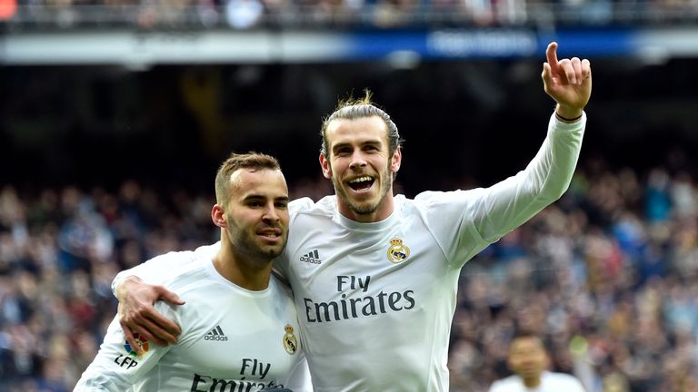Real Madrid's forward Jese Rodriguez (L) celebrates a goal with Real Madrid's Welsh forward Gareth Bale