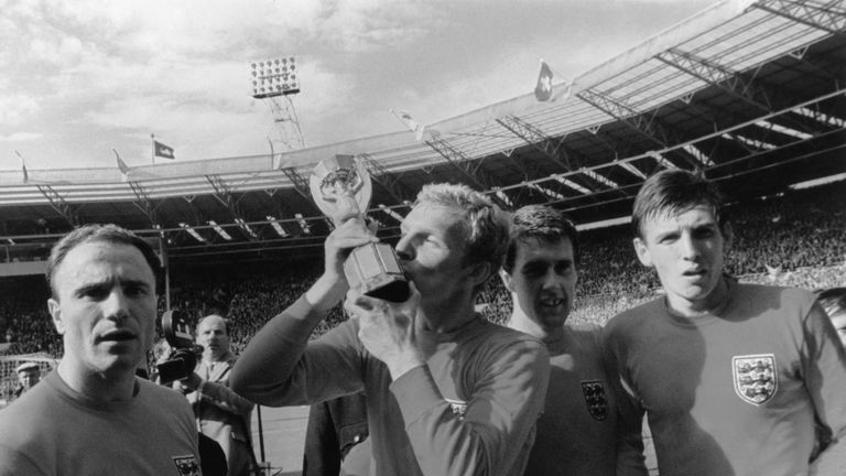 30th July 1966:  Bobby Moore (1941 - 1993), England captain, kisses the Jules Rimet World Cup trophy after England's 4-2 win over West Germany in the World