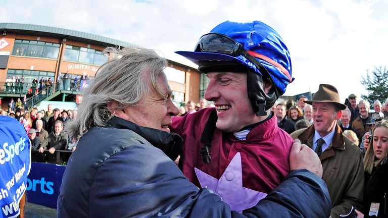 Jockey Ger Fox celebrates with trainer Mouse Morris