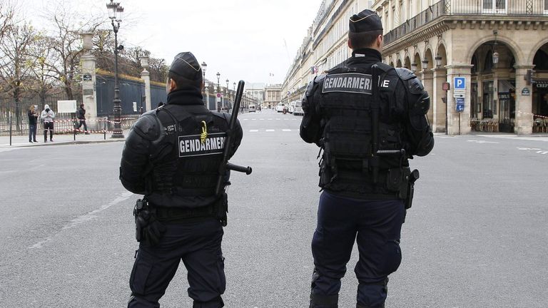 French police stand guard in Paris
