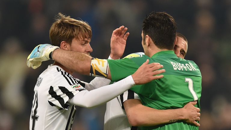 Gianluigi Buffon (R) of Juventus FC celebrates victory and his record of minutes without conceding goals