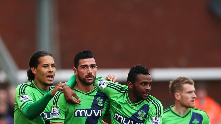 Graziano Pelle (2nd L) is congratulated by his team-mates after opening the scoring for Southampton at Stoke