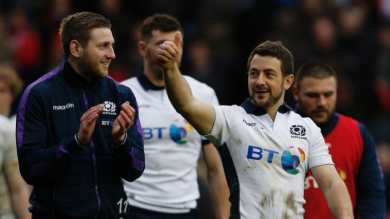 Scotland's captain and scrum half Greig Laidlaw (R) gesture to the crowd following the Six Nations match between Scotland and France 