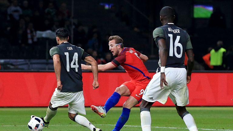 England's Harry Kane (centre) scores their first goal of the game during the International Friendly match at the Olympic Stadium, Berlin