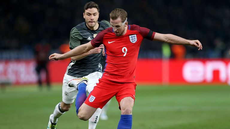 England's Harry Kane and Germany's Jonas Hector (left) in action at the Olympic Stadium, Berlin.