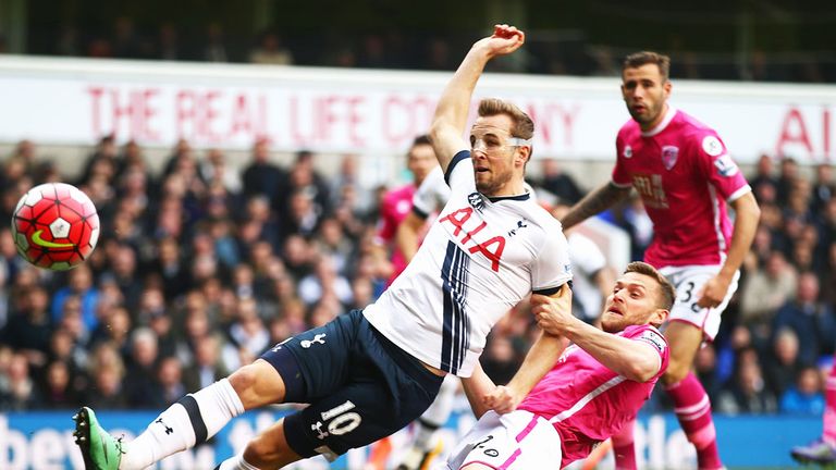 Harry Kane (L) scoring the first of his two goals against Bournemouth