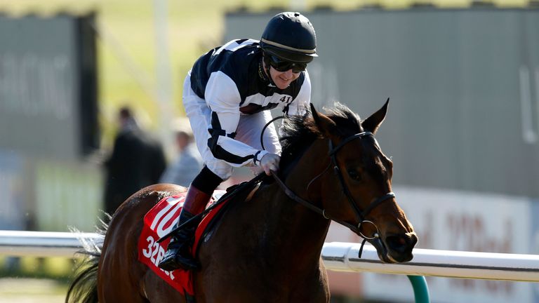 Volunteer Point ridden by Graham Gibbons wins the 32Red All-Weather Fillies' And Mares' Championships Conditions Stakes at Lingfield