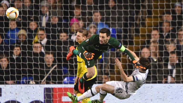 LONDON, ENGLAND - MARCH 17:  Hugo Lloris and Ben Davies of Tottenham Hotspur collide during the UEFA Europa League round of 16, second leg match between To