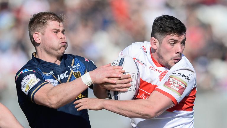 First Utility Super League - Hull KR v Hull FC - KC Lightstream Stadium, Hull, England.- Hull KR's Chris Clarkson fends off Hull FC's Danny Washbrook.