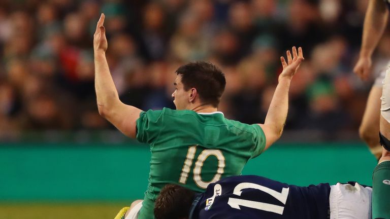 Johnny Sexton appeals to the referee after being tackled by Alex Dunbar during Ireland's Six Nations clash with Scotland