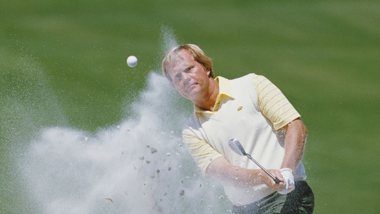 Jack Nicklaus of the United States chips out of the sand bunker on 10th April 1986 during the US Masters Golf Tournament at the Augusta National Golf Club 