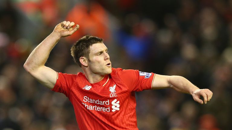 James Milner celebrates scoring Liverpool's second goal against Manchester City