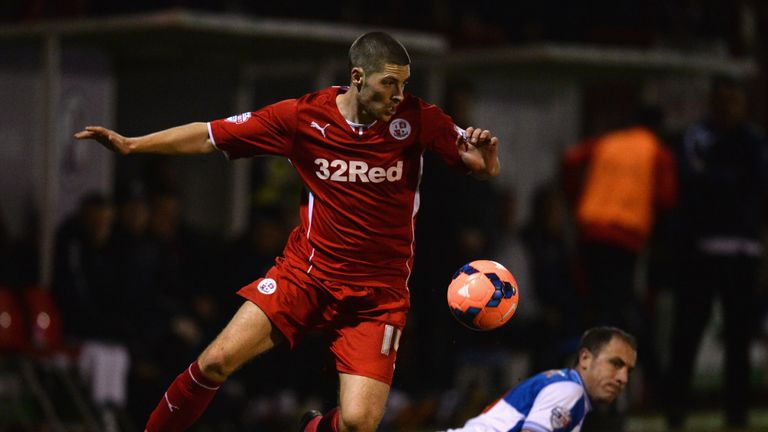  Jamie Proctor of Crawley gets away from Mark McChrystal of Bristol Rovers during the FA Cup Second Round Replay between