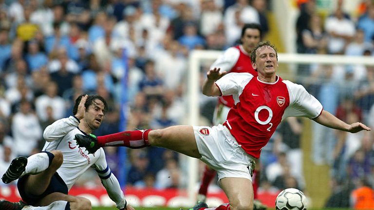LONDON, UNITED KINGDOM:  Arsenal's Ray Parlour (R) is fouled by captain Jamie Redknapp  of Tottenham during their Premier League clash at White Hart Lane i