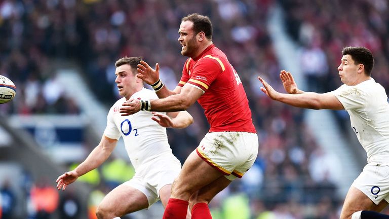 Jamie Roberts (C) in action against England