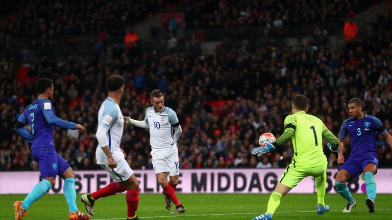 LONDON, ENGLAND - MARCH 29:  Jamie Vardy (c) of England scores the opening goal past Jeroen Zoet
