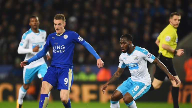 LEICESTER, ENGLAND - MARCH 14:  Jamie Vardy of Leicester City is watched by Vurnon Anita of Newcastle United during the Barclays Premier League match betwe