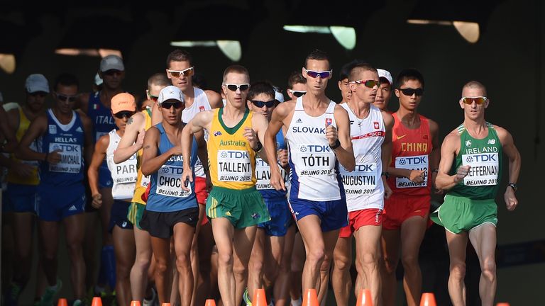 Australia's Jared Tallen (gold vest) and Ireland's Rob Heffernan (green) compete in the 2015 World Championships men's 50km race walk