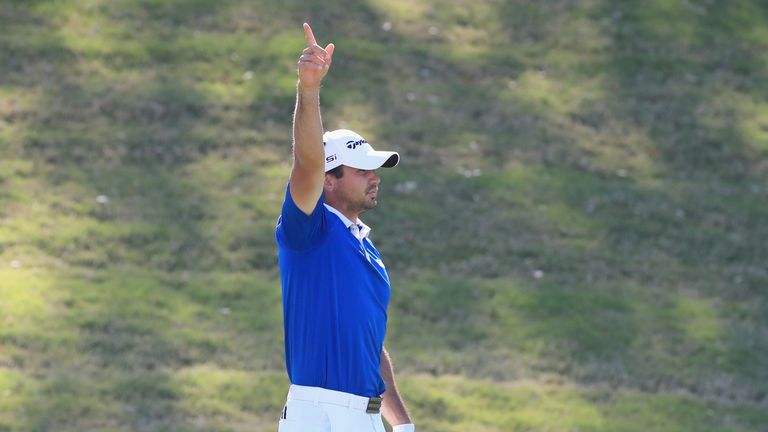 Day wrapped up victory with a superb approach to the 14th green