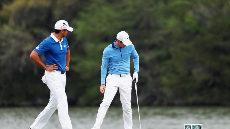 Jason Day (L) faced Rory McIlroy in the semi-finals