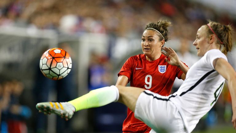 England  forward Jodie Taylor attacks USA defender Becky Sauerbrunn in the SheBelieves Cup match on March 3, 2016 at Raymond James Stadium in Tampa.. 