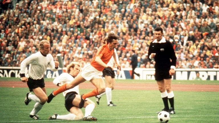 1974:  Johan Cruyff of Holland jumps a tackle from Uli Hoeness of West Germany during the 1974 World Cup Final. Mandatory Credit: Allsport UK/ALLSPORT