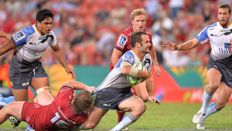 Jono Lance of the Force is tackled during their victory over the Reds