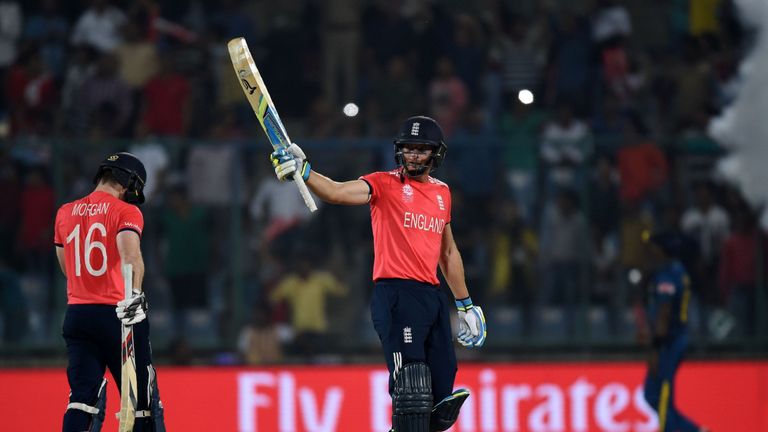 England's Jos Buttler(C)celebrates after scoring a half-century during the World T20 against Sri Lanka