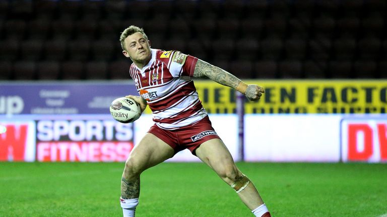 Wigan Warriors Josh Charnley celebrates his hat-trick try against Hull Kingston Rovers, during the First Utility Super League match at the DW Stadium.