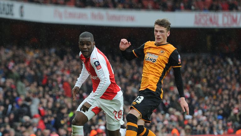 Joel Campbell of Arsenal skips past Josh Tymon of Hull during the match between Arsenal and Hull City in the FA Cup 5th Round at Emirates Stadium