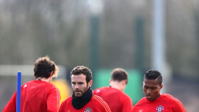 MANCHESTER, ENGLAND - MARCH 16:  Juan Mata of Manchester United warms up during a training session ahead of the UEFA Europa League round of 16 second leg m