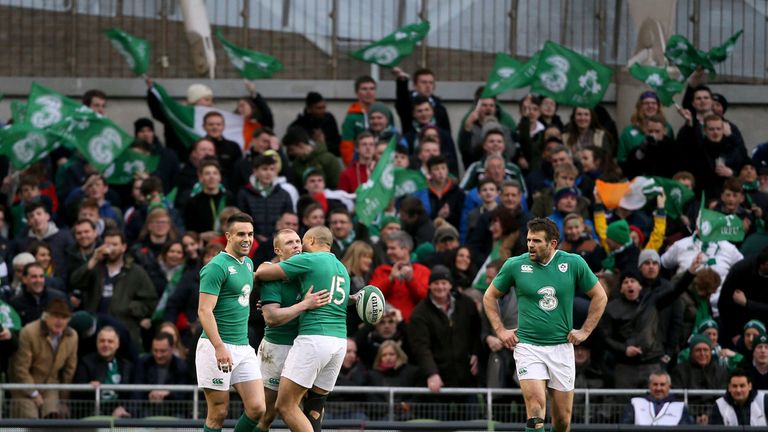 Ireland's Keith Earls (second left) celebrates scoring their second try with team-mates Johnny Sexton (left) and Simon Zebo