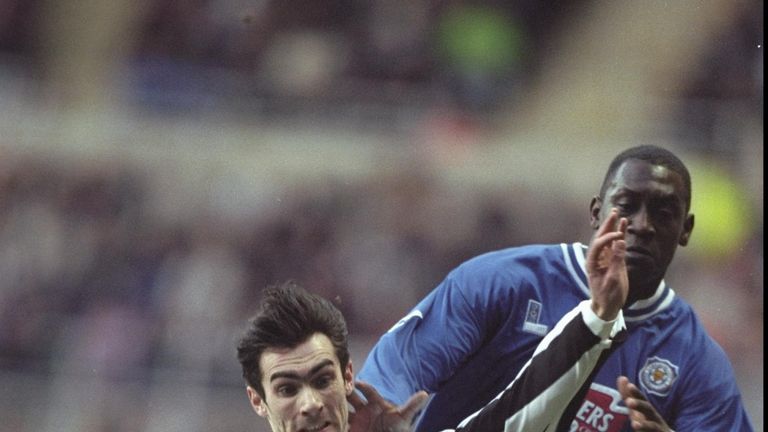 2 Feb 1997:  Keith Gillespie of Newcastle lunges for the ball as Emile Heskey of Leicester gives chase. During the FA Carling Premier league match between 