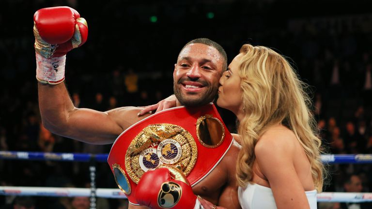 Kell Brook celebrates victory over Kevin Bizier with partner Lindsey Myers during the IBF World Welterweight Championship bout at Sheffield Arena.