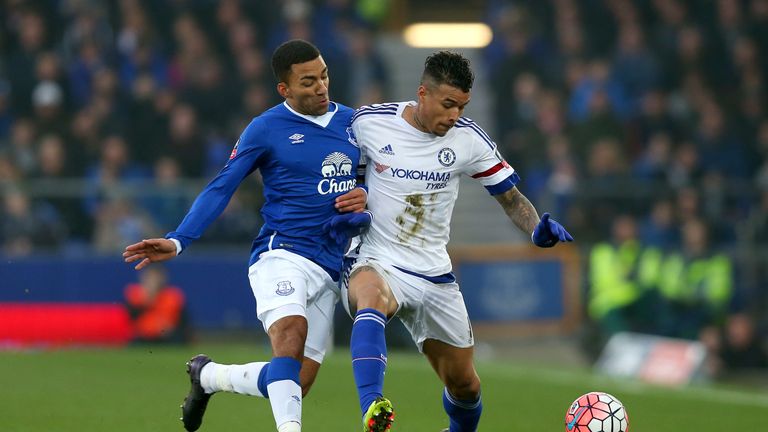 Kenedy of Chelsea and Aaron Lennon of Everton compete for the ball 