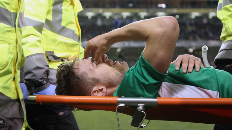 Republic of Ireland's Kevin Doyle is stretchered off 